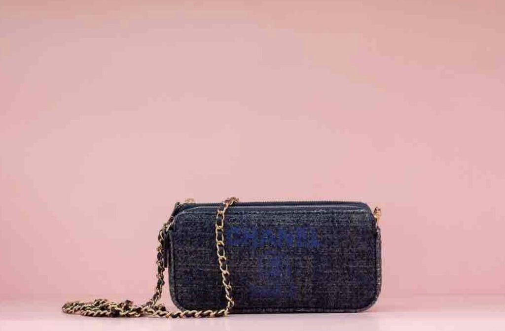Chanel Tweed Blue Crossbody Bag with Chain Strap.