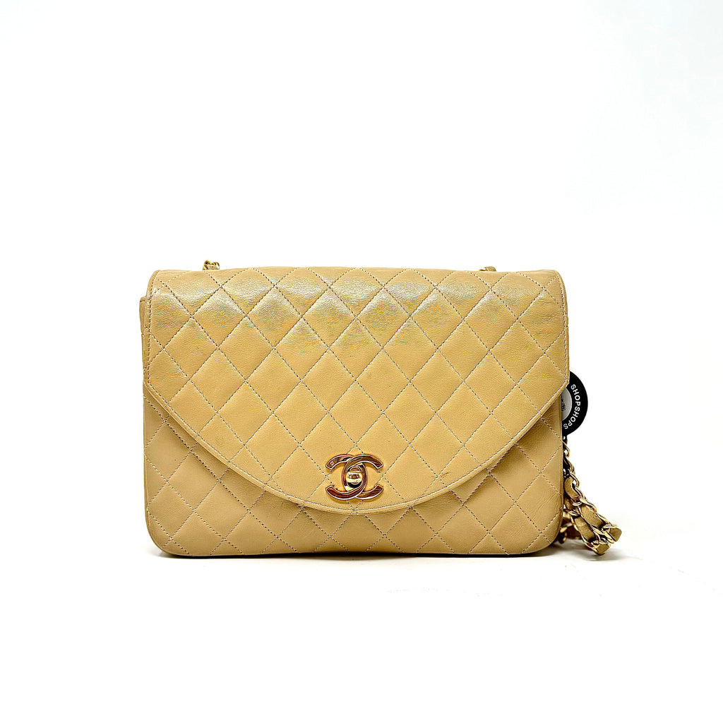 Chanel Small Beige Chevron Crossbody Bag.