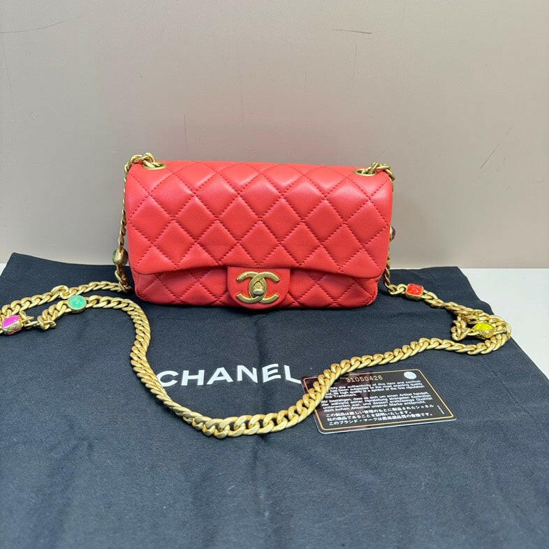 Chanel Red Lambskin Small Flap Bag with Gold Chain.