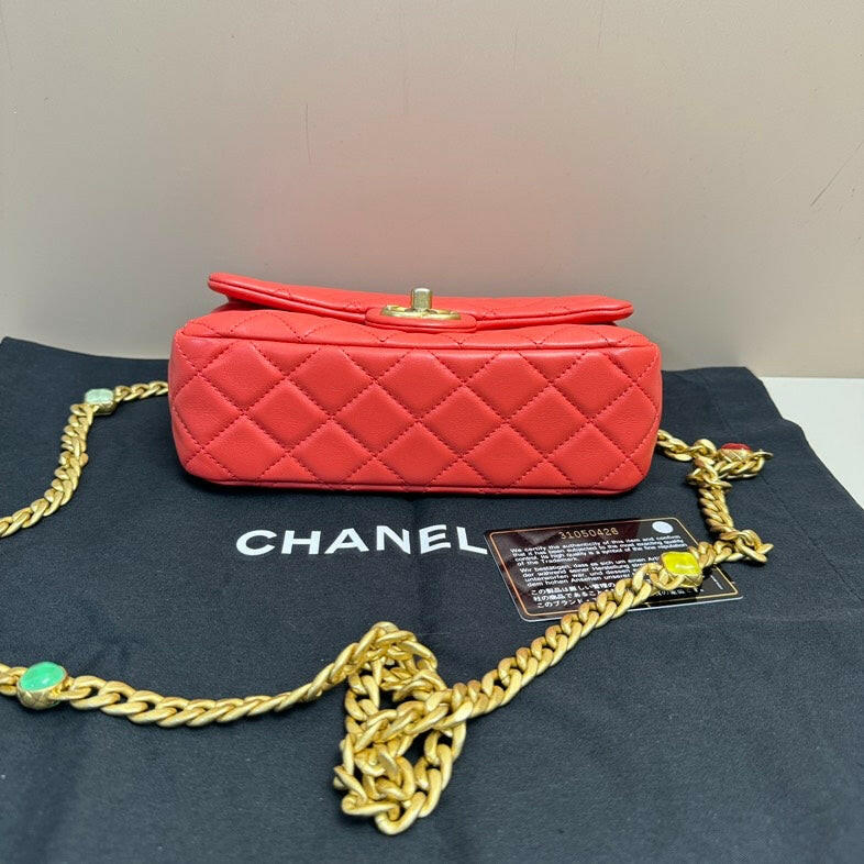 Chanel Red Lambskin Small Flap Bag with Gold Chain.