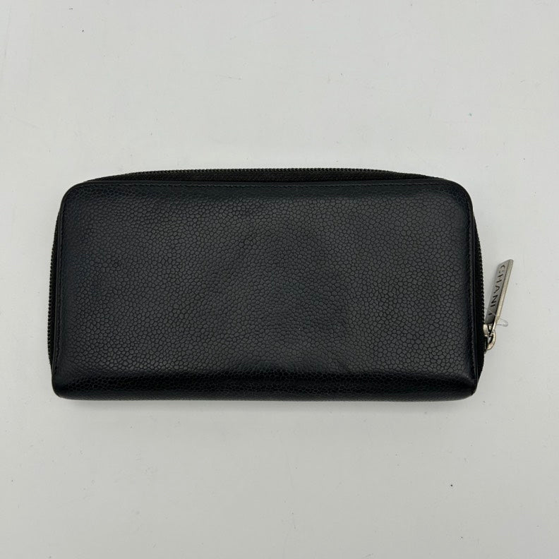 Chanel Black Leather Zip Around Clutch Wallet.