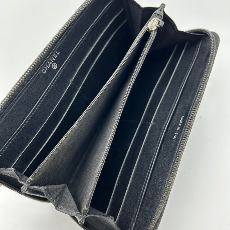 Chanel Black Leather Zip Around Clutch Wallet.